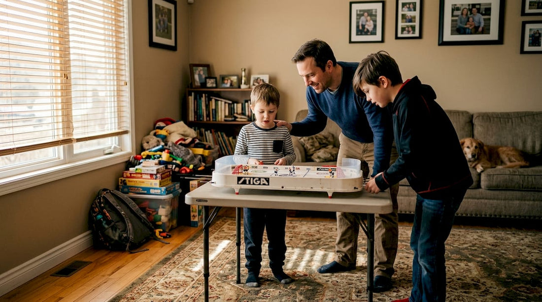Family playing table hockey in cozy home
