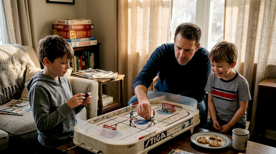 Family playing lively table hockey game together